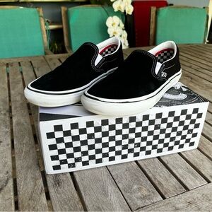 Vans slip on black skating shoes. Worn, but “damage” is very minimal